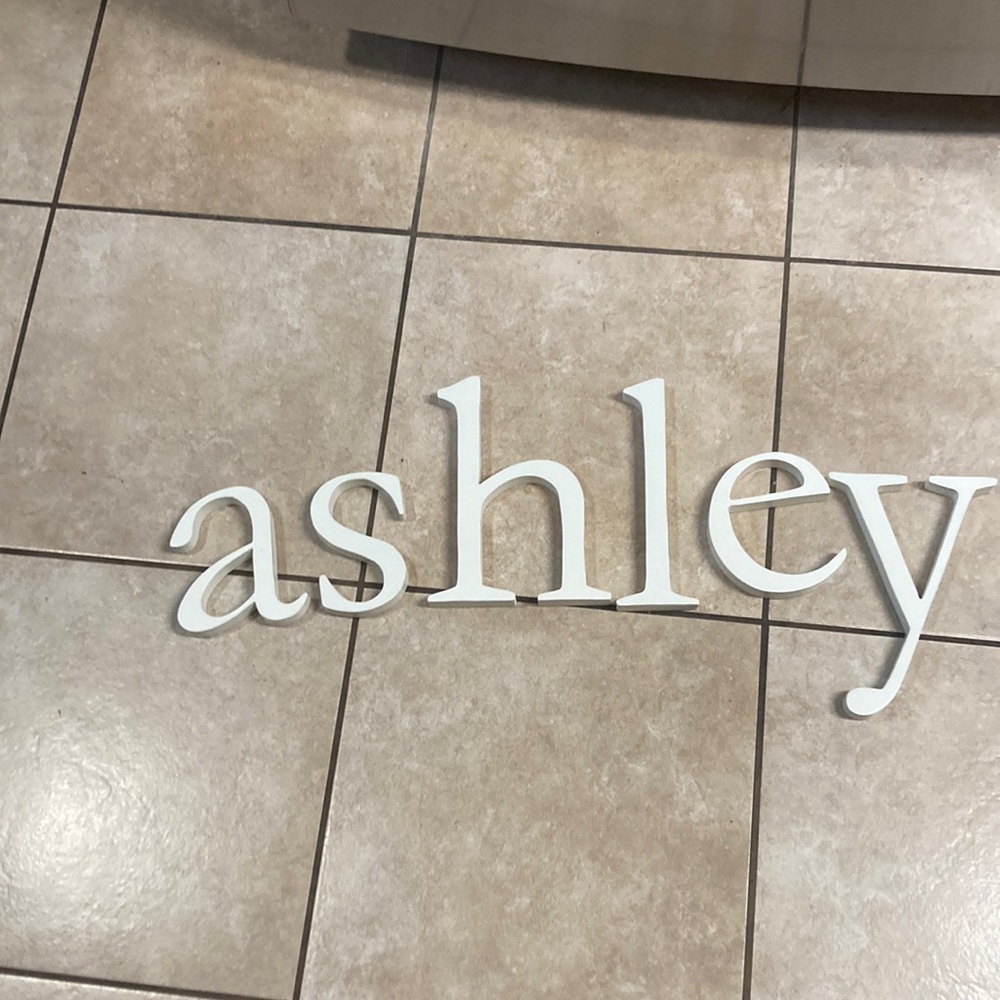 Wood letters spell Ashley in off white